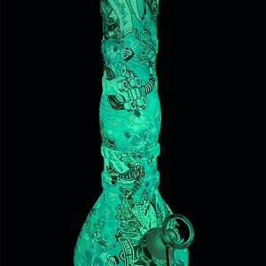 Glow In The Dark Blue Monster Silicone Beaker Bong standing upright with surreal blue artwork