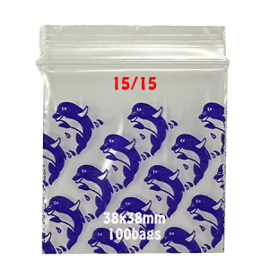 Clear resealable plastic zip lock bag featuring a blue dolphin print and red 15/15 label. Size: 38mm x 38mm. Supplied in packs of 100. Ideal for herbs, samples, and novelty items. – 38mm x 38mm (100 Bags)